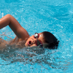 child swimming and having fun